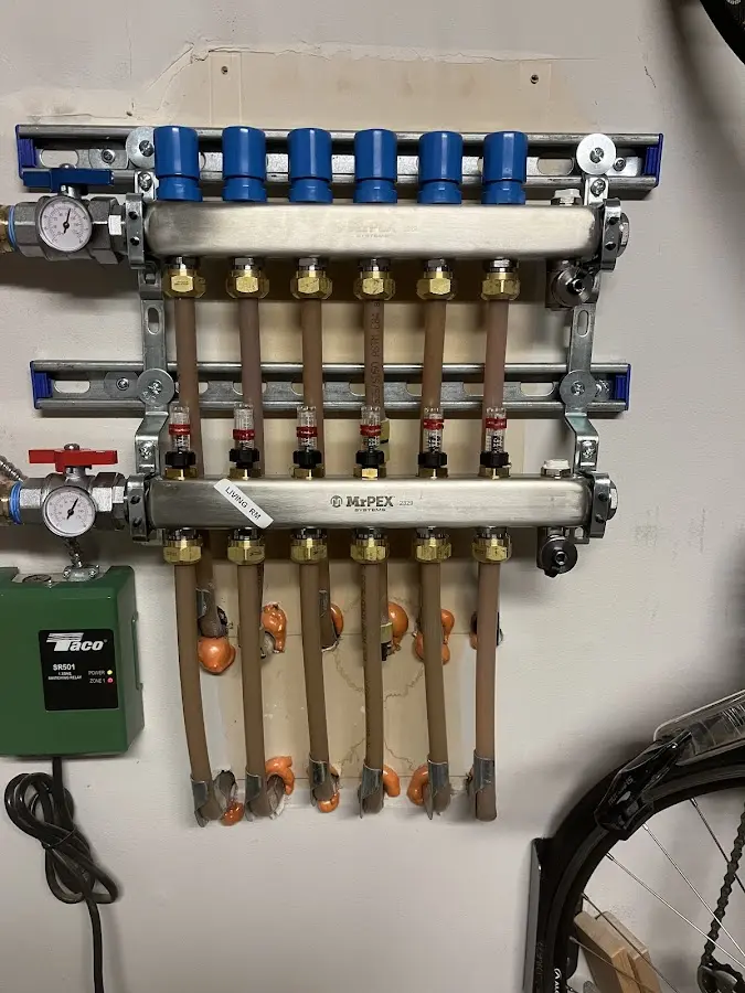 Plumber performing Leak Detection at a residential property in Oshtemo